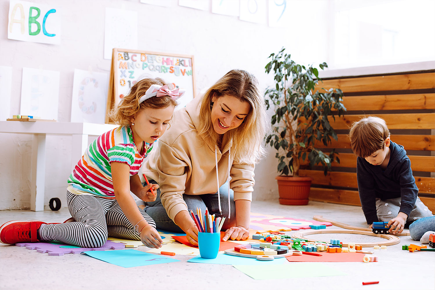 autistic child learning with instructor