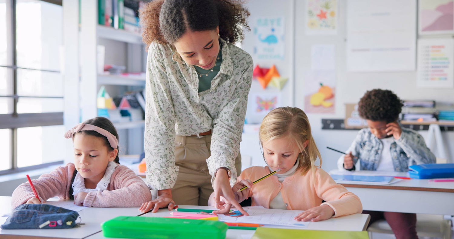 teacher working with a child