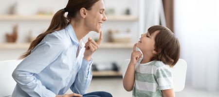 autistic child learning with ABA Therapist