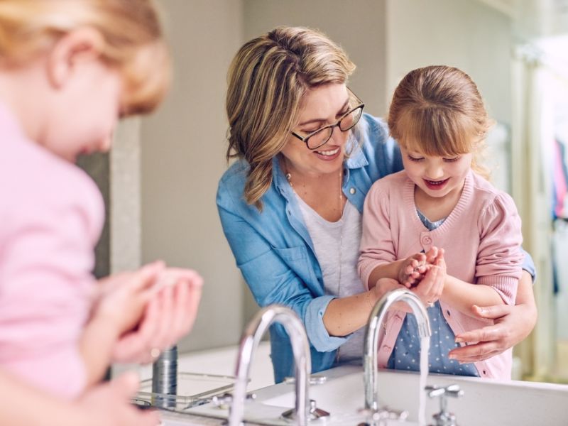 How To Help Your Child Tolerate Haircuts, Toothbrushing, and Hygiene