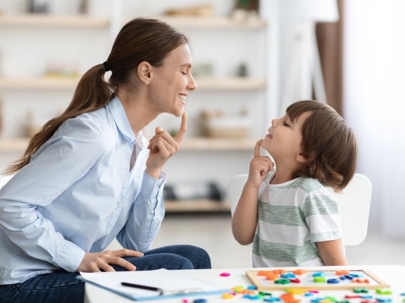autistic child learning with ABA Therapist